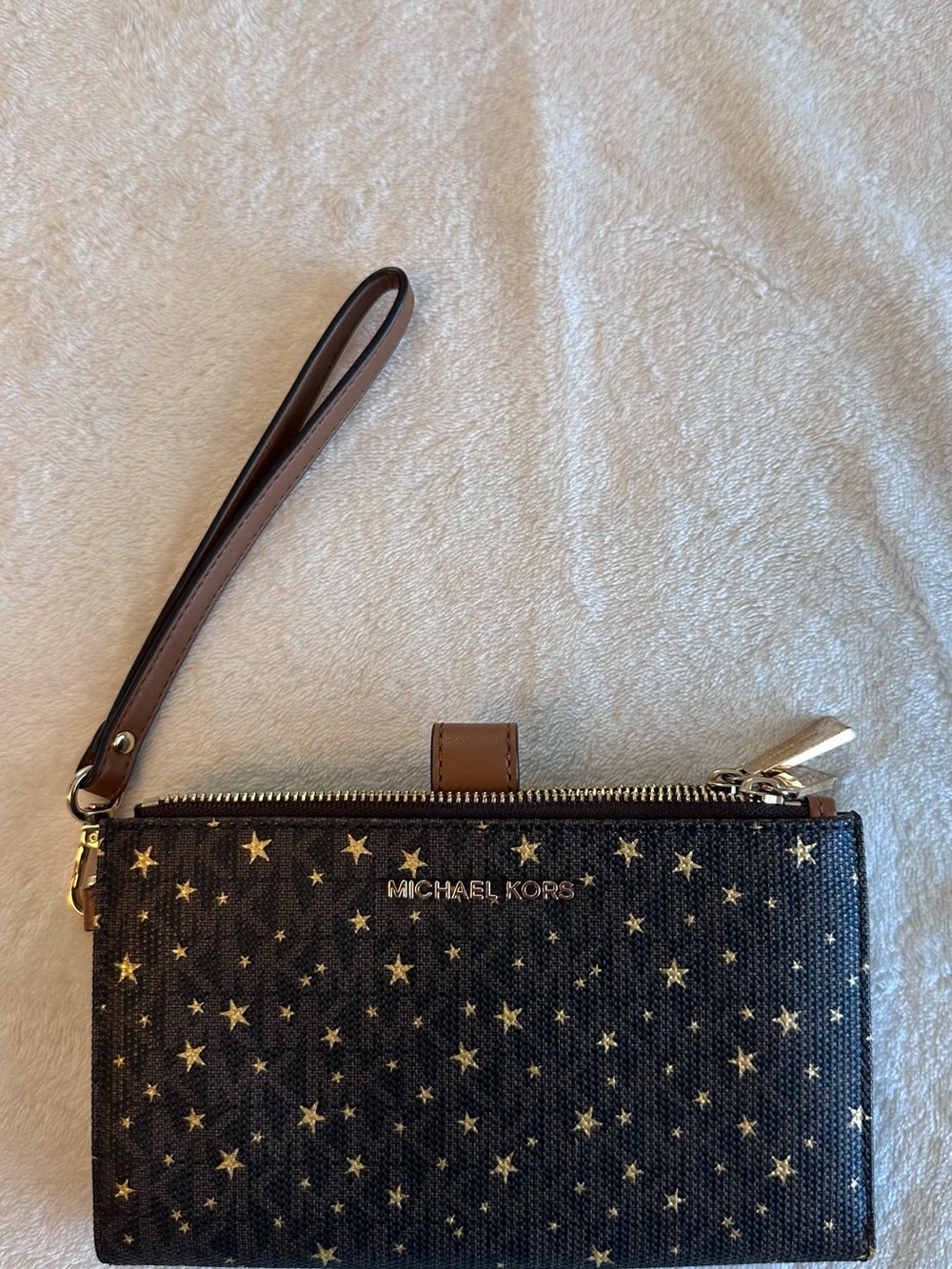 Michael Kors Black Wristlet with Gold Star Print